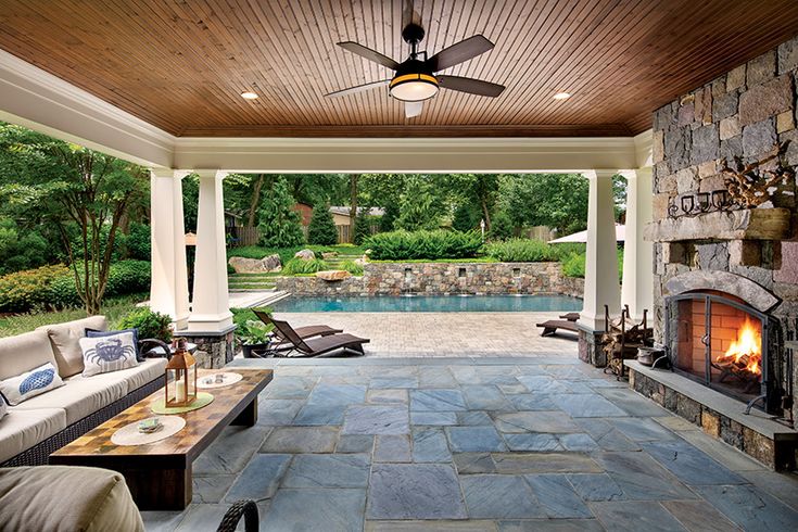 pennsylvania bluestone paver covered patio with pool in background