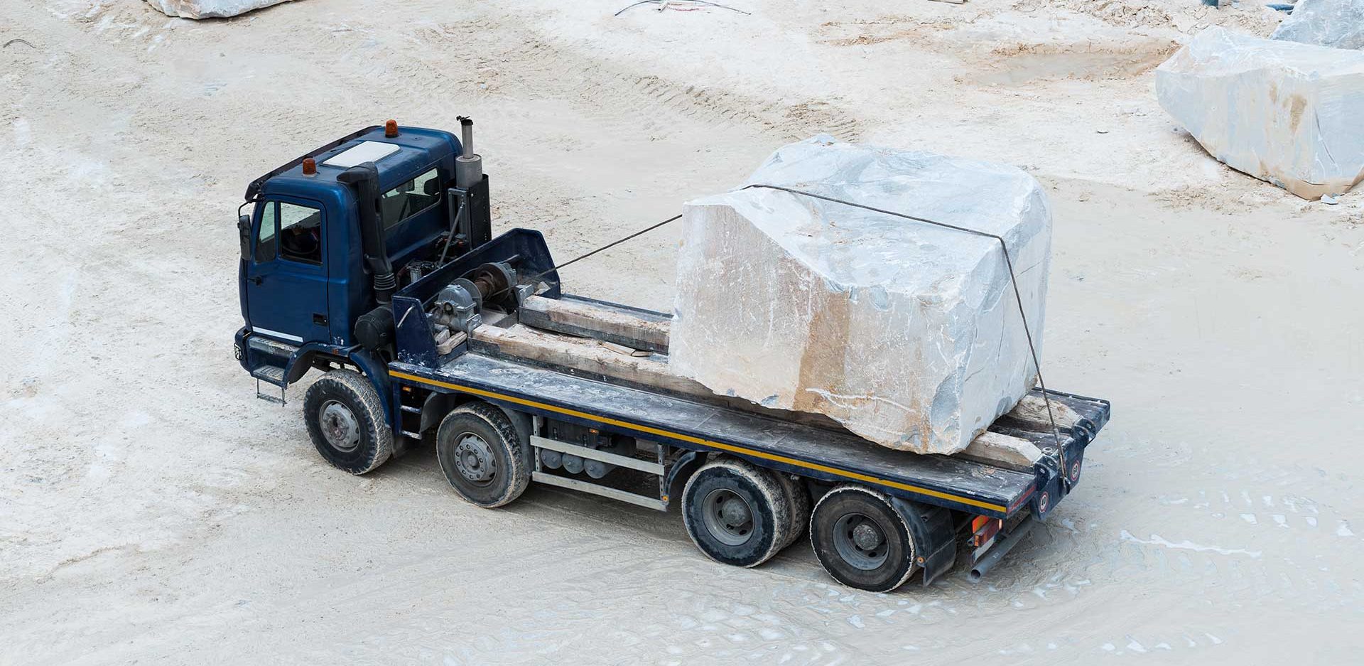 quartzite at quarry on back of truck